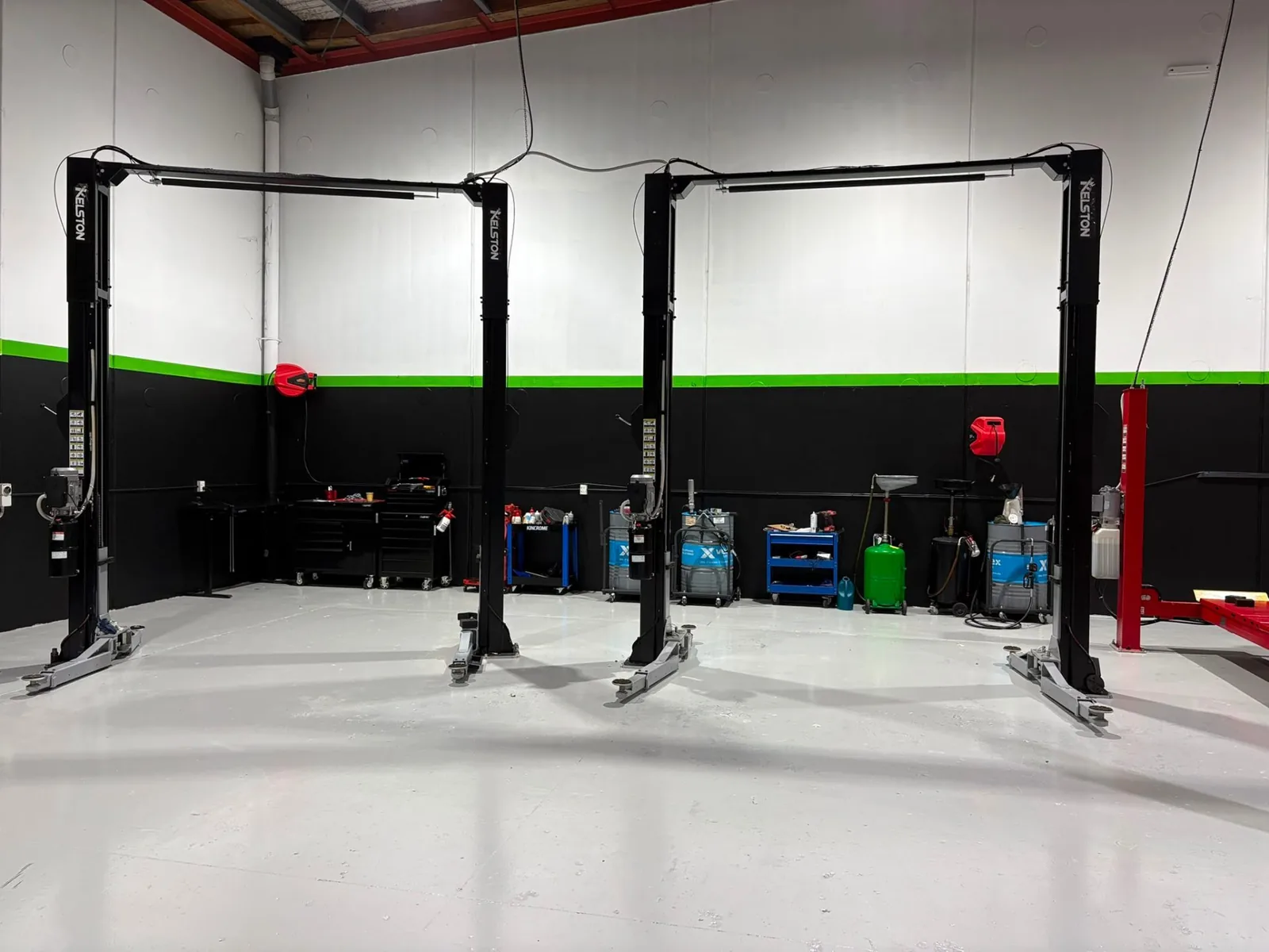 Twin Kelston two-post hoists in the main service bay